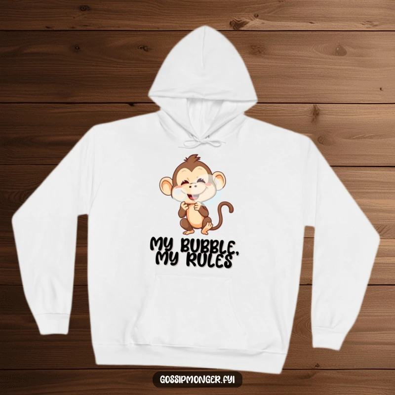 Funny hoodie depicting a mischievous monkey with a playful grin, blowing a large, translucent bubble.
