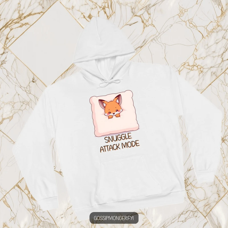 Funny hoodie featuring a tiny kawaii fox peeking from behind a giant, plush pillow, offering cozy comfort and shy charm.
