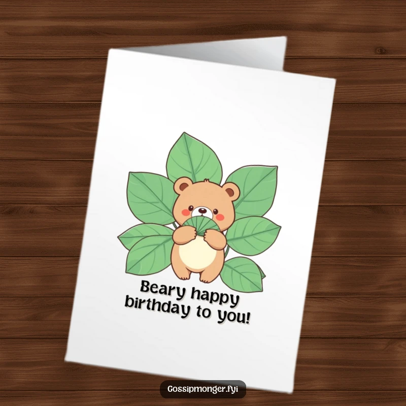 Funny Free Printable Birthday Card: Small round bear holding a fan made of gigantic leaves, cooling off hilariously.