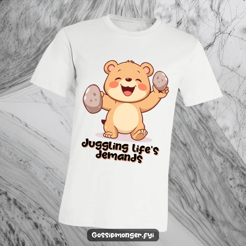 Funny bear t-shirt depicting a joyful bear cub grinning widely while expertly juggling three oversized shiny pebbles.